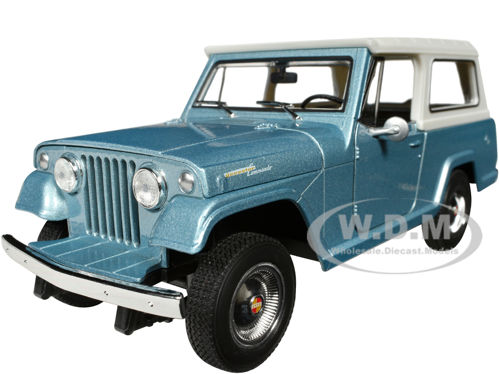 1967 Jeep Jeepster Commando Station Wagon Light Blue Metallic with White Top NEX Models Series 1/24 Diecast Model Car by Welly