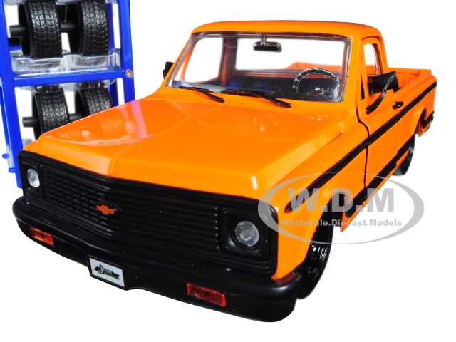 1972 Chevrolet Cheyenne Pickup Truck Orange with Black Stripes and Extra Wheels Just Trucks Series 1/24 Diecast Model Car by Jada